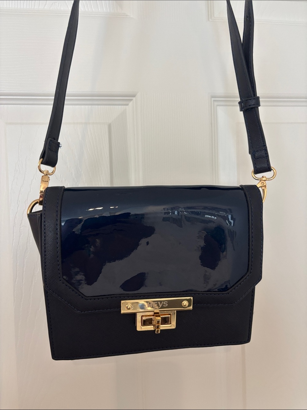 HEYS Crossbody Bag Glossy Navy blue Flap close turn lock removable strap
